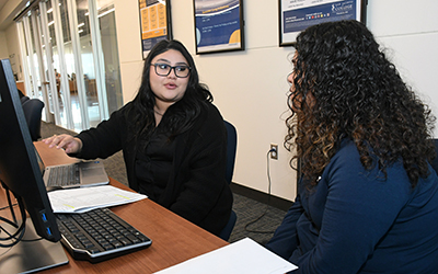 Advisor helping student choose classes